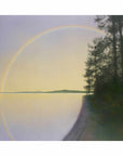 An evening rainbow arcs over a tranquil Arctic lake, glowing softly in the pure northern light.