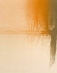 A golden-orange abstract landscape print suggesting the calm presence of trees beside still water.