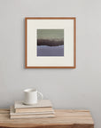 “This Beautiful Night” is displayed above a wooden bench with a book and cup, a print that glows with the quiet light of evening.