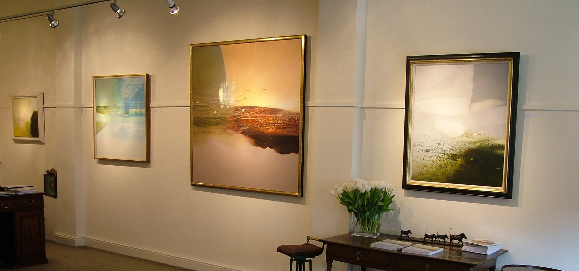 four framed abstract landscape painting by Nicholas Jones hang in the Crane Kalman Gallery, London